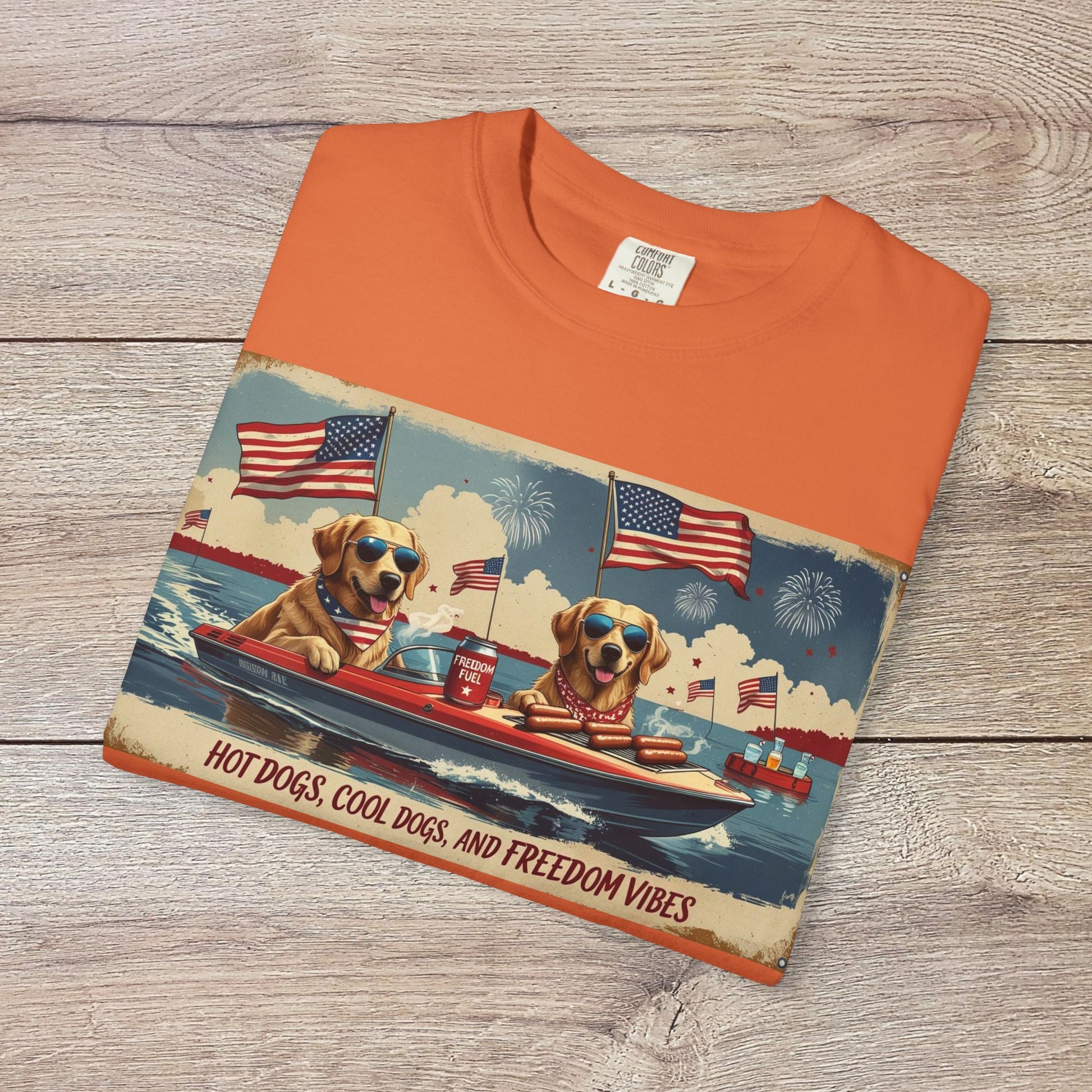 Men's Golden Tee featuring a fun graphic of dogs in sunglasses on a boat with American flags, perfect for summer vibes. Comfortable Cotton T-Shirt with Ribbed Collar, Sizes S-5XL.