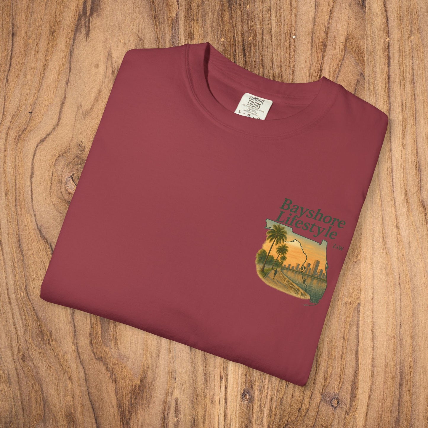 Folded Bayshore Lifestyle Tee in burgundy featuring a stylish graphic design, crafted from 100% cotton lightweight fabric.