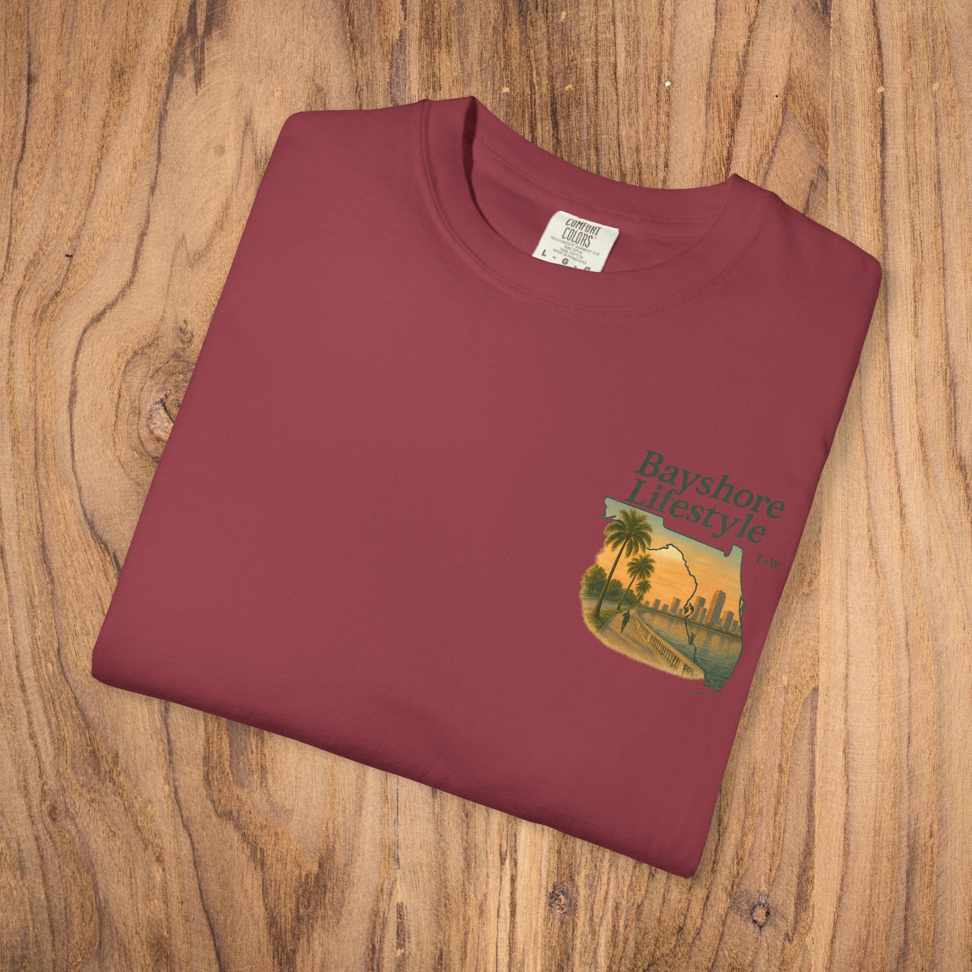 Folded Bayshore Lifestyle Tee in burgundy featuring a stylish graphic design, crafted from 100% cotton lightweight fabric.