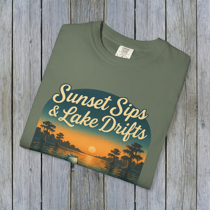 Lake Drifts T-Shirt featuring sunset design in olive green color, highlighting soft 100% US cotton fabric with unique colors.