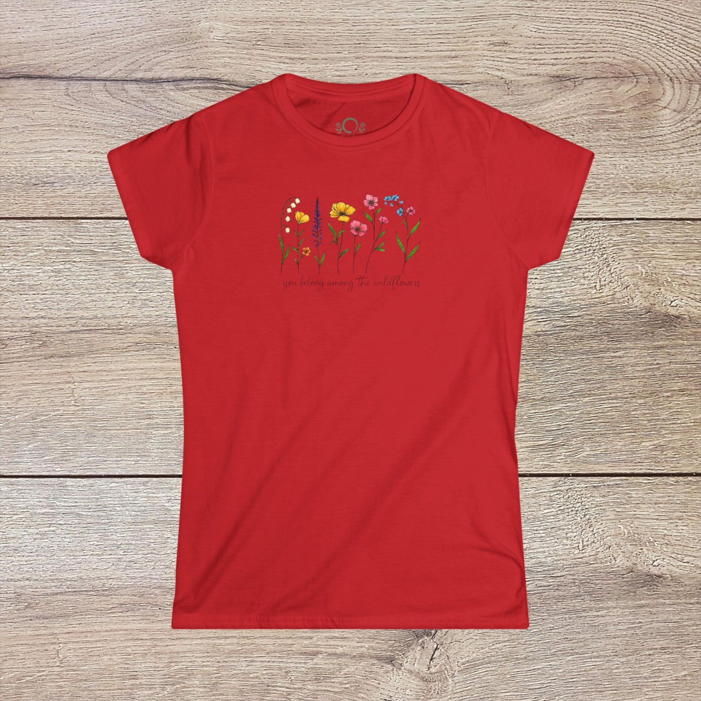 Wildflowers T-Shirt in red highlighted with a vibrant floral illustration and the caption 'you belong among the wildflowers'. Excellent choice for casual outings.