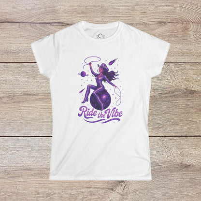 Vibrant Ride The Vibe Tee in white featuring a stylish graphic of a woman riding a planet, designed in durable 100% ring-spun cotton.