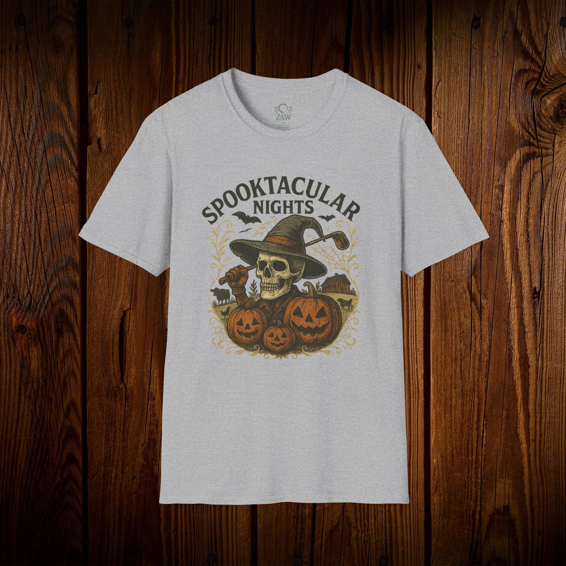 Spooktacular Nights Halloween T-Shirt for Unisex displaying a unique skull and pumpkins graphic on a light gray background, great for autumn-themed parties.