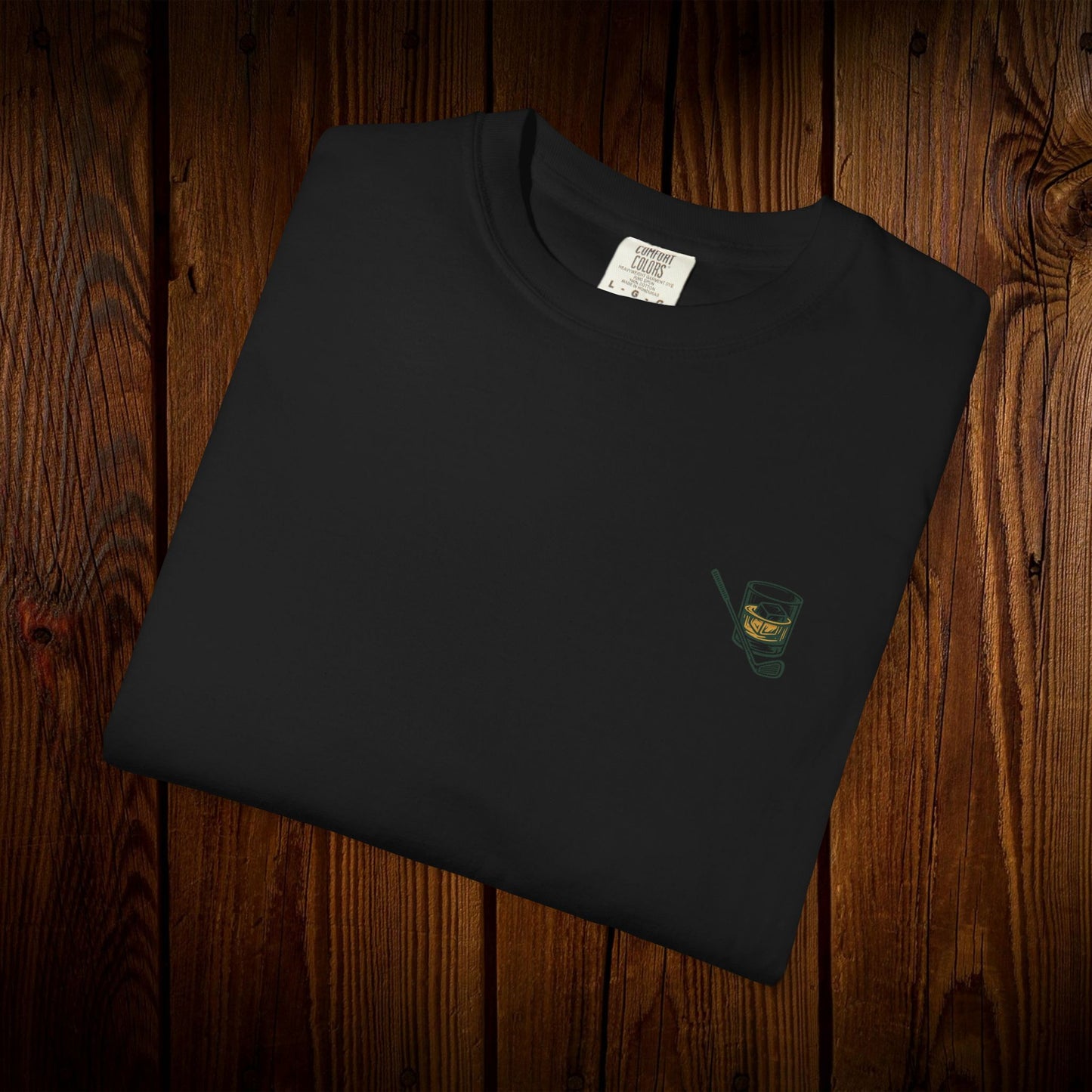 Men's Golf & Whiskey Tee in black showcasing a whiskey glass illustration, crafted from soft, eco-friendly cotton.