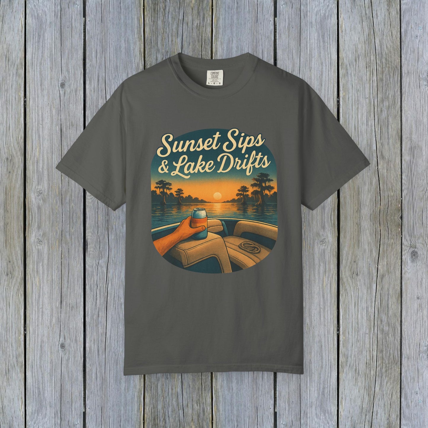 Lake Drifts T-Shirt in charcoal gray featuring a sunset and drink illustration, perfect for a relaxed stylish look.