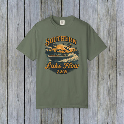 Southern Lake Flow T-Shirt in olive green, featuring an adventurous water skiing illustration, made from 100% US cotton, available in sizes S to 4XL.