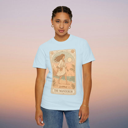 Wanderer Tarot Graphic Tee in refreshing light blue, featuring The Wanderer illustration. This ethically made tee is composed of 100% cotton and available in sizes S to 4XL, designed for unique style and comfort.