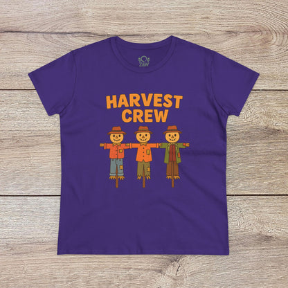 Harvest Crew Halloween T-Shirt in purple showcasing playful scarecrow illustrations alongside the phrase 'Harvest Crew'. Crafted from soft, ethical 100% ring-spun cotton, perfect for festive celebrations.