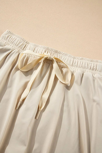 Close-up of the Drawstring High Waist Lined Active Skorts showing the elasticated waistband and drawstring adjustment for a perfect fit.