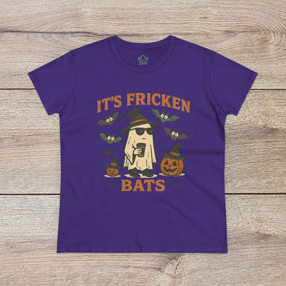 Halloween Unisex T-Shirt in purple displaying a playful ghost graphic with bats and pumpkins. Crafted from 100% cotton, ideal for trick-or-treating.