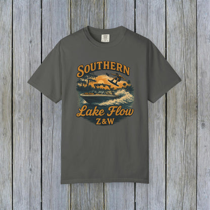 Southern Lake Flow T-Shirt in charcoal gray, highlighting a bold print of a water skier, constructed from 100% US cotton, sustainably made and available in sizes S to 4XL.