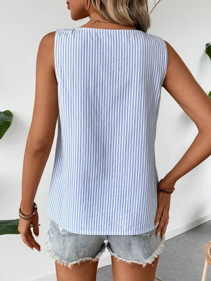 Back view of the Asymmetrical Striped Tank with Decorative Buttons for Women in blue stripes, showcasing a casual and relaxed fit, made from 100% polyester.