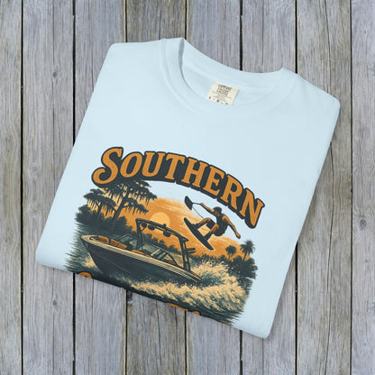 Folded Southern Lake Flow T-Shirt in light mint, highlighting the retro wakeboarding graphic, showcasing sustainable fashion made from 100% US cotton.