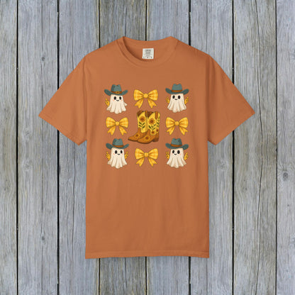 Cute Halloween T-Shirt showcasing adorable ghosts and cowboy boots, designed for unisex fall fashion. Crafted from eco-friendly fabric, great for Halloween festivities.