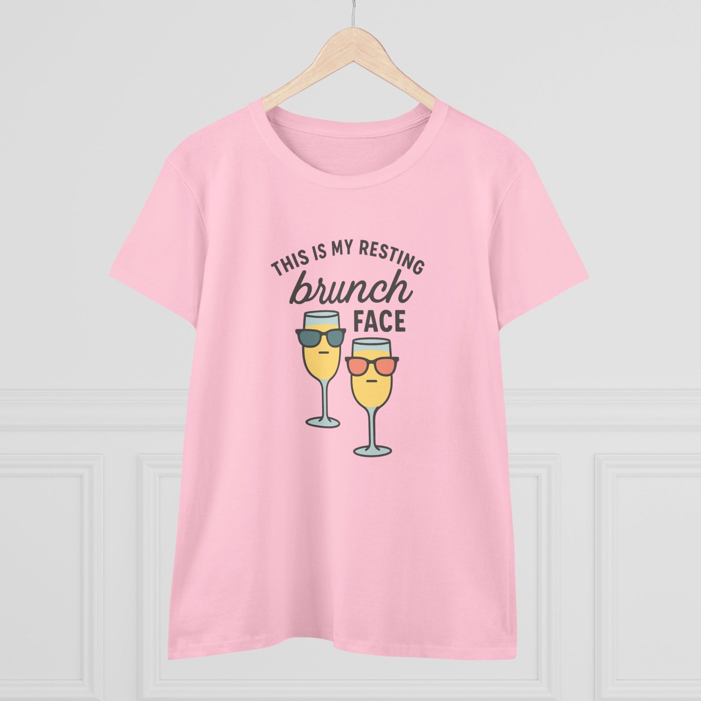 Women's Premium 100% Cotton Brunch Face Tee in pink featuring a playful design of two glasses with sunglasses and the text 'This is my resting brunch face'. Perfect for casual outings and brunch events.