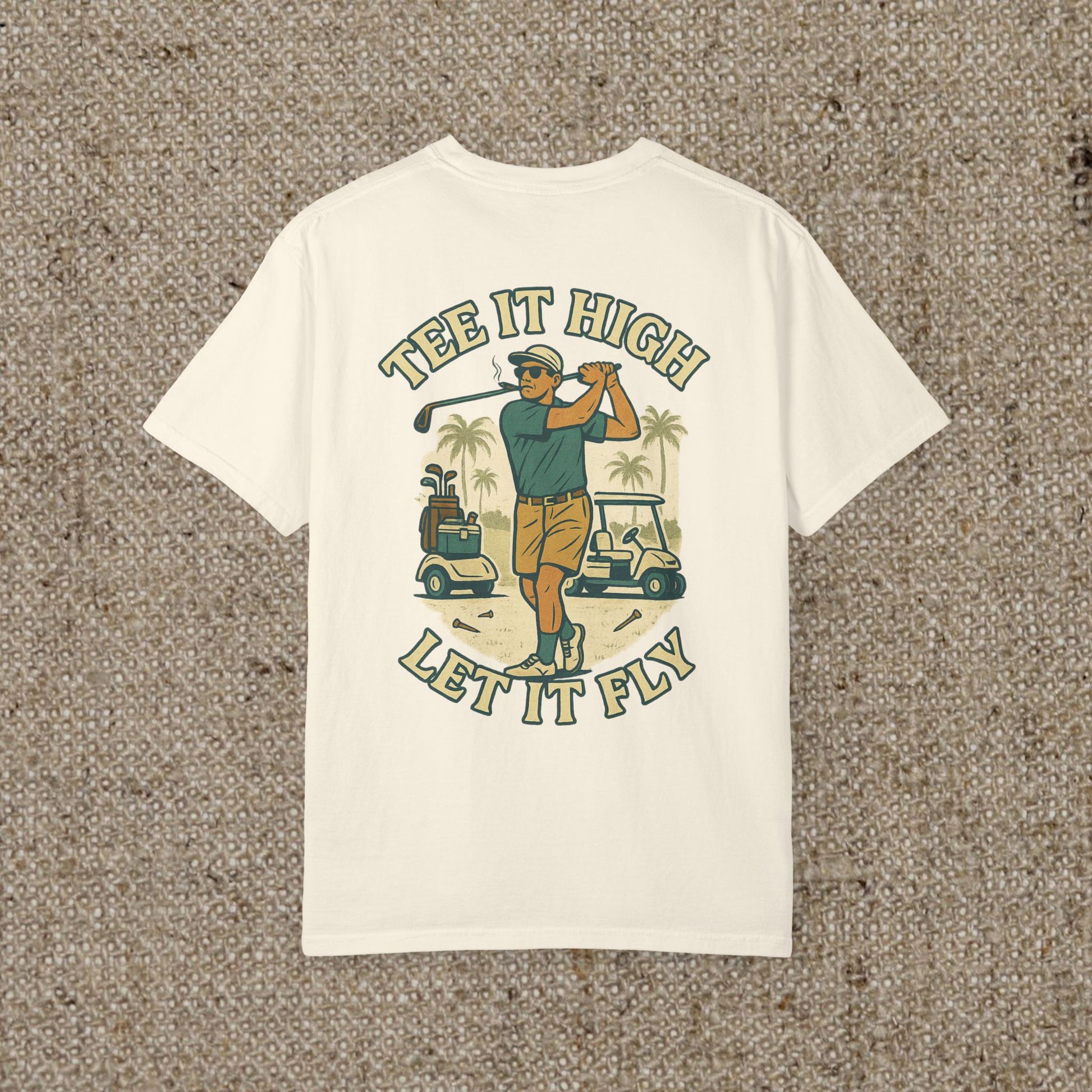 White version of the Tee It High Let It Fly Graphic Tee displaying a golfer and the phrase 'Let it Fly', ideal for a fresh and stylish look.