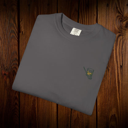 Men's Golf & Whiskey Tee in dark gray with a chic whiskey glass graphic, crafted from soft cotton and designed for eco-friendliness.