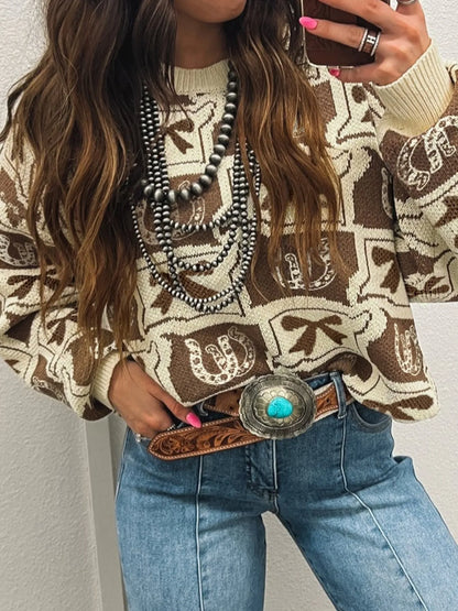 Trendy Graphic Round Neck Long Sleeve Sweater - Soft Viscose Blend with Stretch, highlighted in a close-up view, complete with trendy necklaces and stylish denim, perfect for a chic and comfortable outfit.
