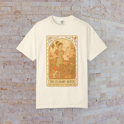 Culinary Queen Tarot Tee in white, displaying a whimsical design of the culinary queen in action, available in sizes S to 4XL, made from soft, pre-shrunk cotton.