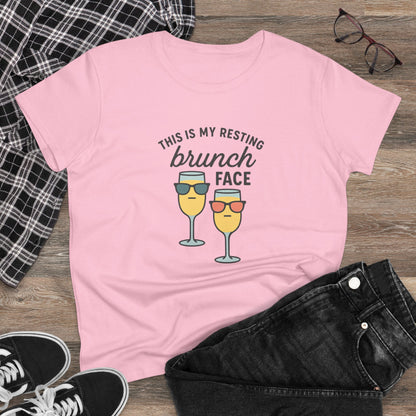 Front view of Women's Premium 100% Cotton Brunch Face Tee featuring a playful design with two glasses and the phrase 'This is my resting brunch face' in pink.