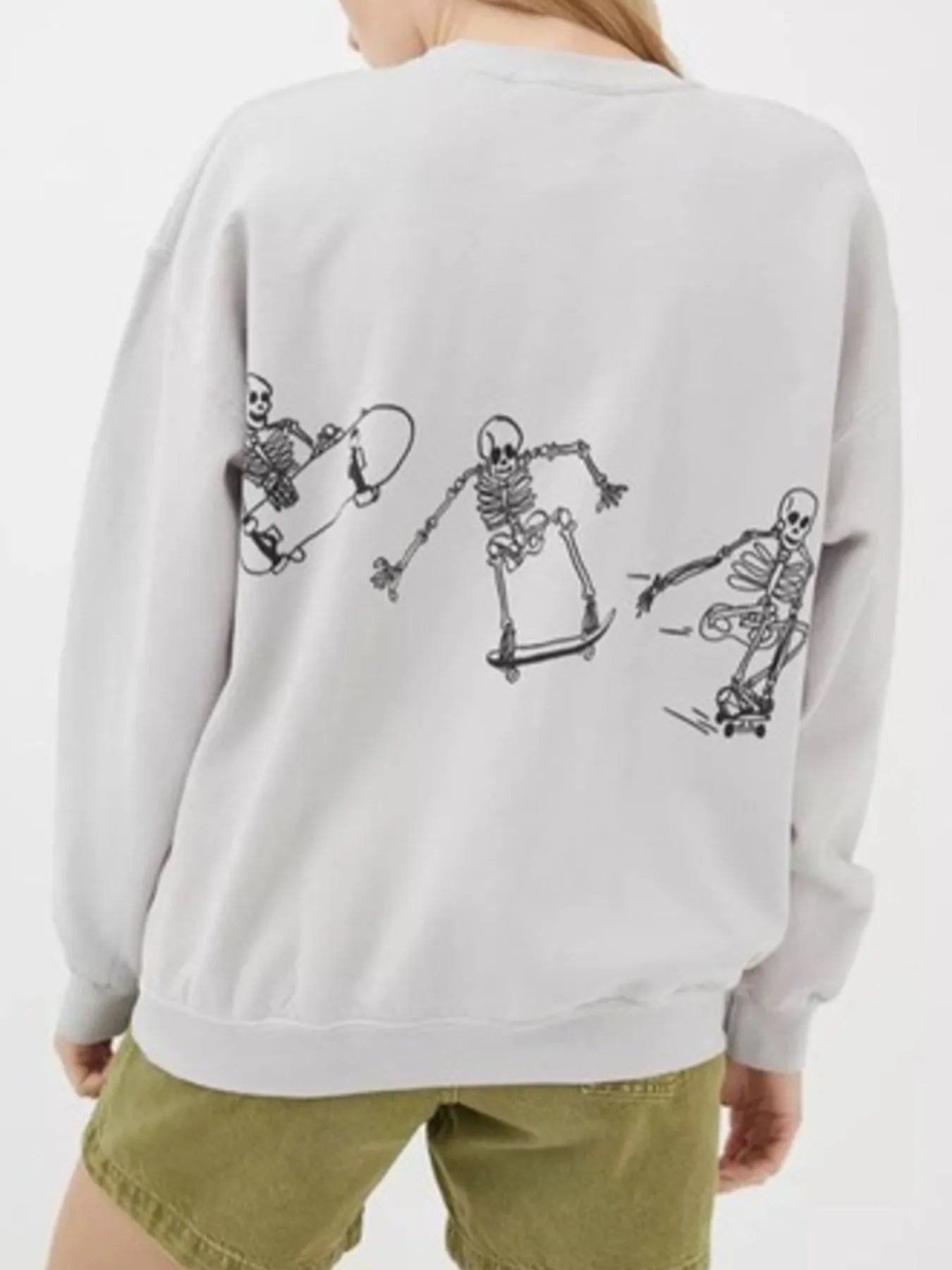 Oversized Skeleton Graphic Sweatshirt for Women displayed from the back, showcasing detailed skeleton graphic design and trendy oversized fit.