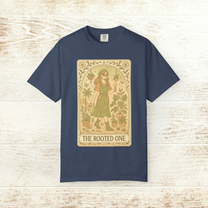 Rooted One Tarot Tee in navy color, featuring a unique tarot-inspired graphic of a woman surrounded by plants, made from ethically sourced cotton.