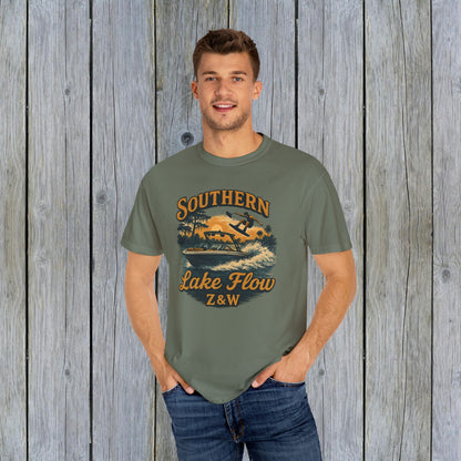 Man wearing Southern Lake Flow T-Shirt in olive green color, showcasing eco-friendly 100% US cotton material. Suitable for casual wear, featuring stylish lake-themed graphics.