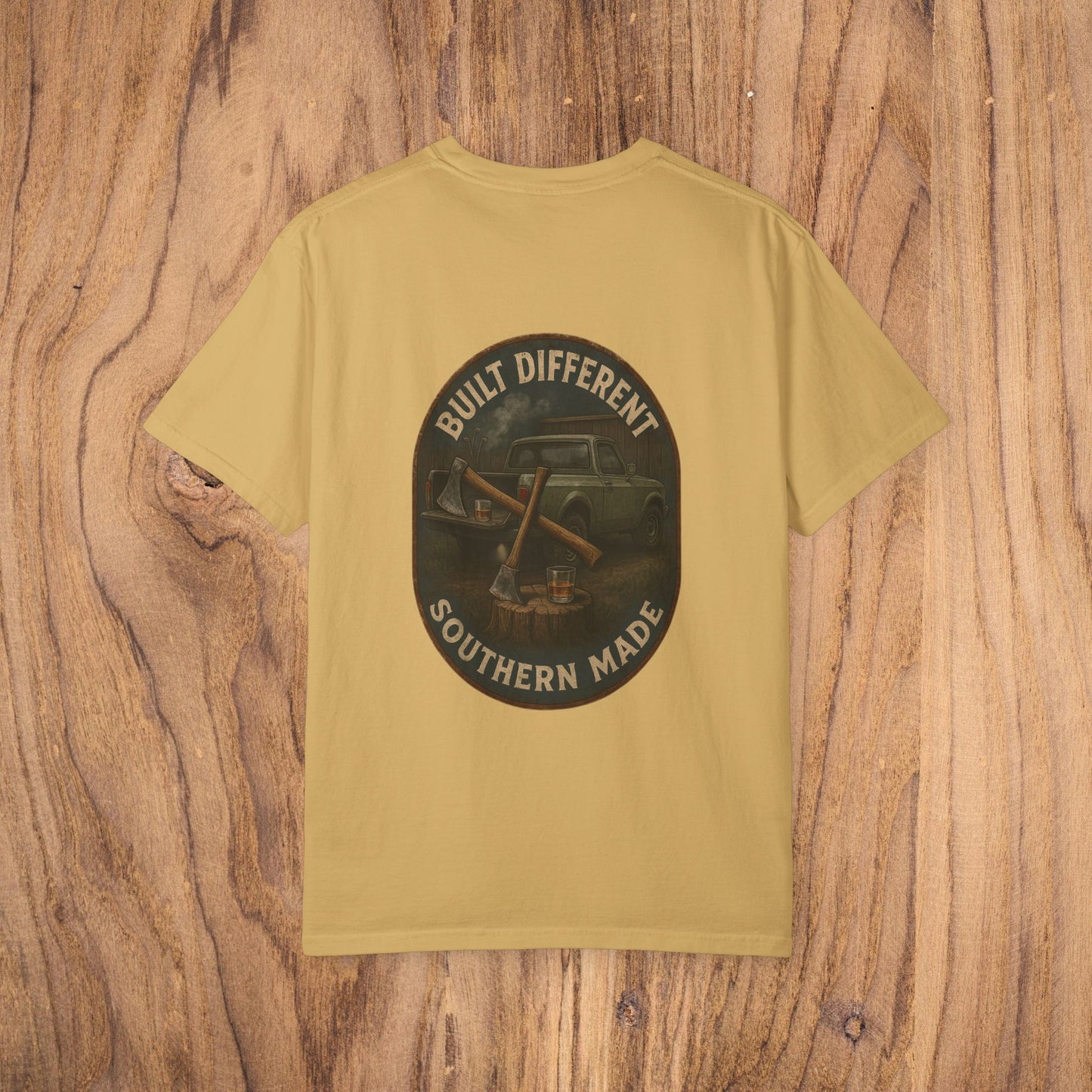 Back view of the Premium Southern Made T-Shirt in a mustard yellow color, featuring a bold graphic that reads 'Built Different Southern Made' on a dark circular design.