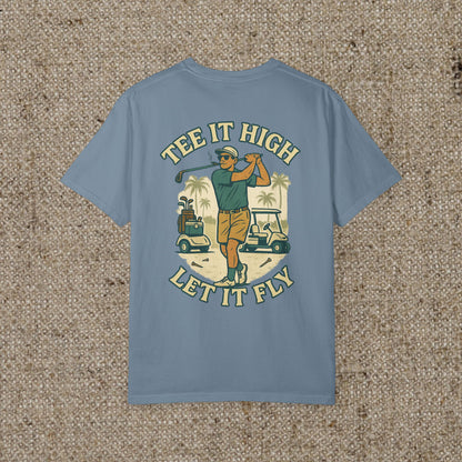 Tee It High Let It Fly Graphic Tee in sky blue, showcasing a vibrant illustration of a golfer swinging, ideal for casual wear on and off the golf course.
