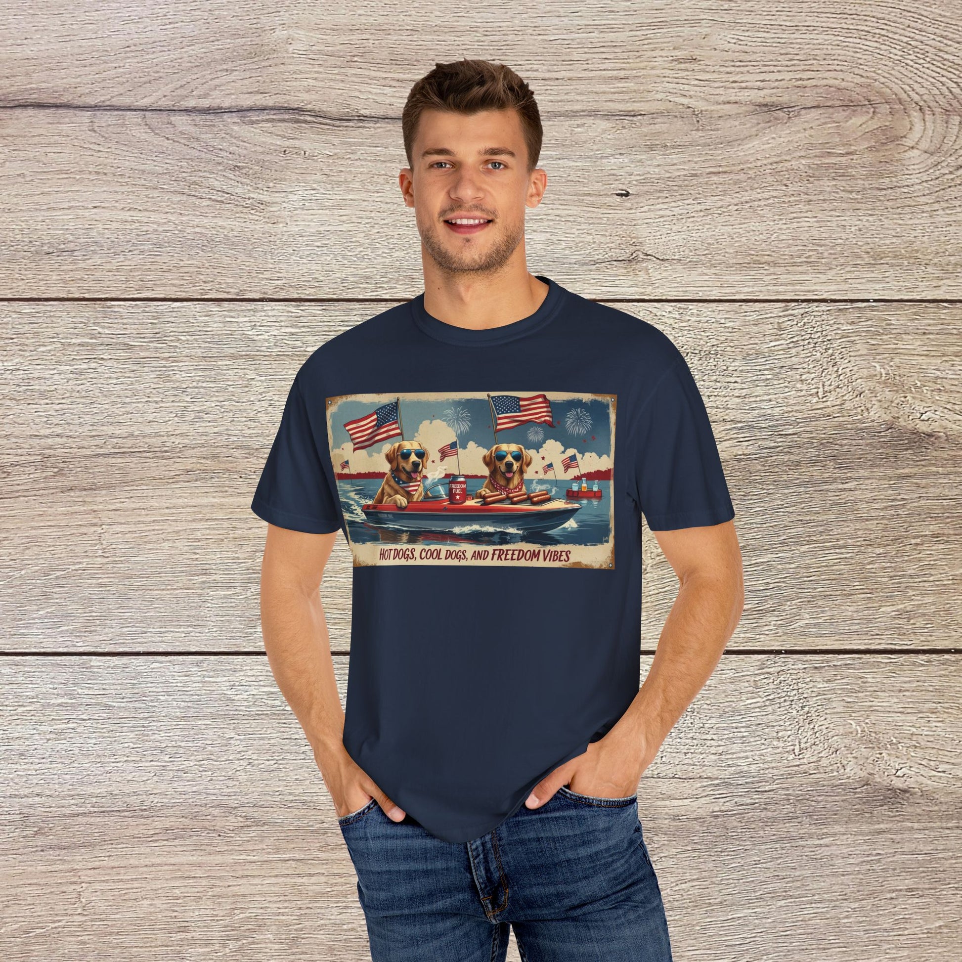 Men's Golden Tee: Comfortable Cotton T-Shirt with Ribbed Collar modeled by a man, featuring a playful print of dogs enjoying a day out on the water with patriotic elements.