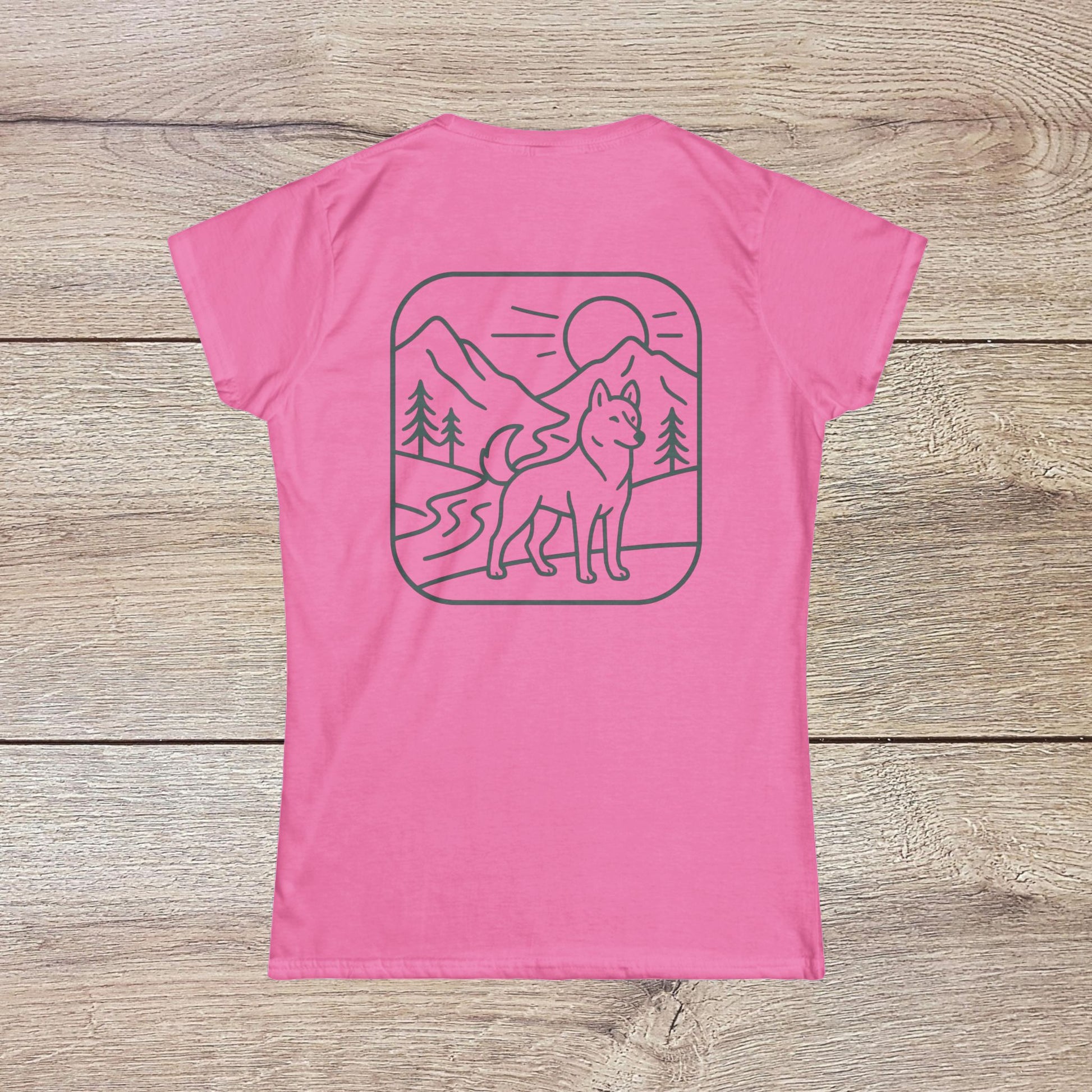 Eco-Friendly Dog T-Shirt - Adventure Spirit, featuring a vibrant pink back graphic of a joyful dog against a scenic mountain sunset.