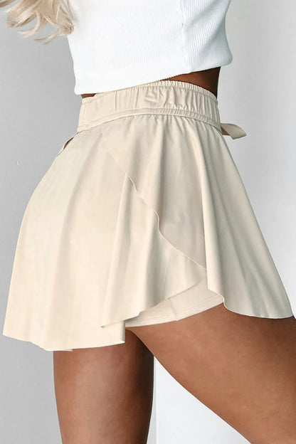 Side view of Drawstring High Waist Lined Active Skorts showcasing the layered fabric and stylish cut.