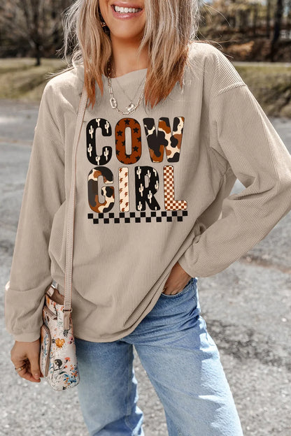 Cowgirl Graphic Long Sleeve Sweatshirt featuring a stylish design and comfortable fit, perfect for casual outings. Model showcasing the sweatshirt with jeans.