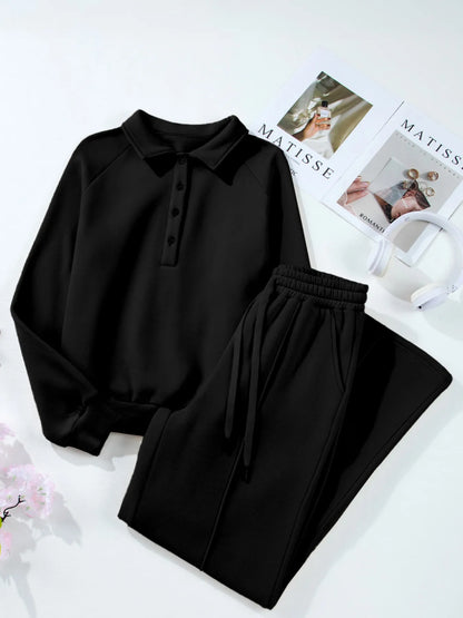 Flat lay of black Trendsi Collared Sweatshirt & High Waist Pants Two-Piece Active Set, highlighting the soft cotton blend fabric and trendy design.
