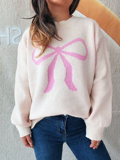 Stylish Bow Pattern Casual Long Sleeve Sweater for Effortless Everyday Wear, highlighted by a pink bow motif, worn casually with jeans for a trendy look.