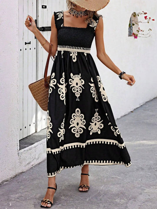 Trendsi Smocked Printed Maxi Dress with Wide Straps worn by a model, emphasizing the stunning design and intricate patterns in a charming outdoor ambiance.