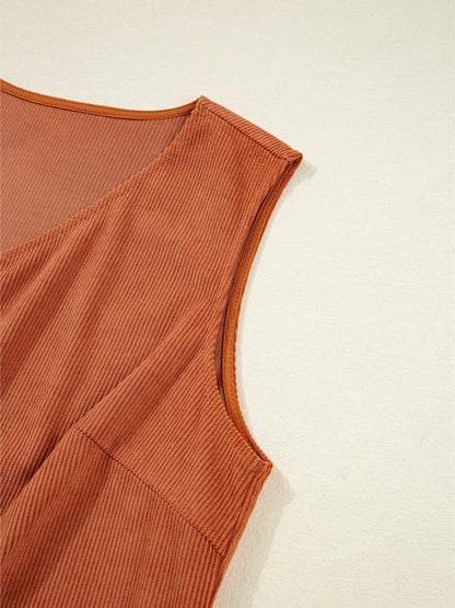Detail shot of the sleeveless design and armhole of the Corduroy Western Mini Dress With Embroidered Patch Pocket, emphasizing its trendy silhouette and comfortable fit.