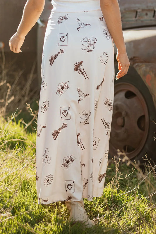 Back view of Trendsi Western Print Satin Long Skirt, displaying intricate western designs on a lightweight fabric, ideal for casual or dressy occasions.