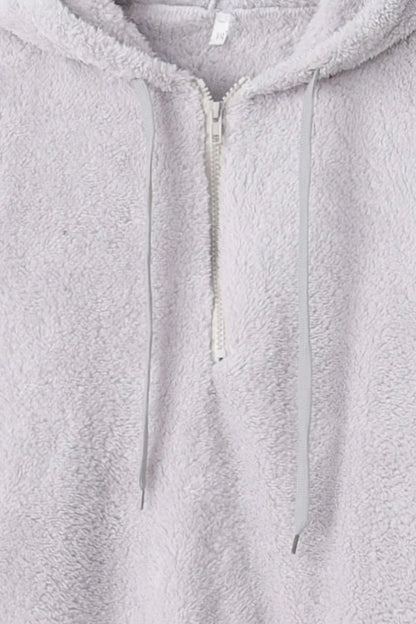 Close-up view of the Cozy Full Size Teddy Hoodie with Quarter-Zip and Drawstring, showcasing the drawstring detail and soft fabric texture.