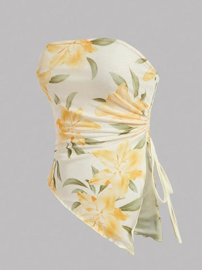 Trendsi Asymmetrical Drawstring Printed Tube Top featuring a floral design in soft colors, ideal for women's fashion. Ruched and slightly stretchy for a fitted look.