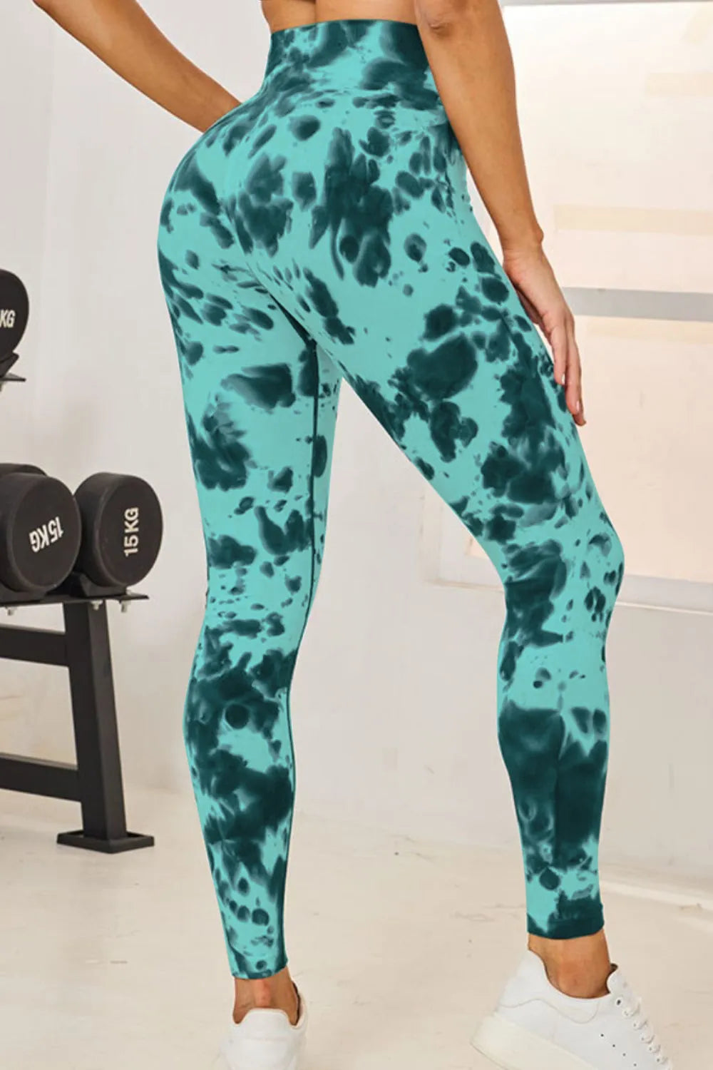 Back view of the Slightly Stretchy Tie-Dye High Waist Active Leggings in teal, showcasing their flattering fit and design.