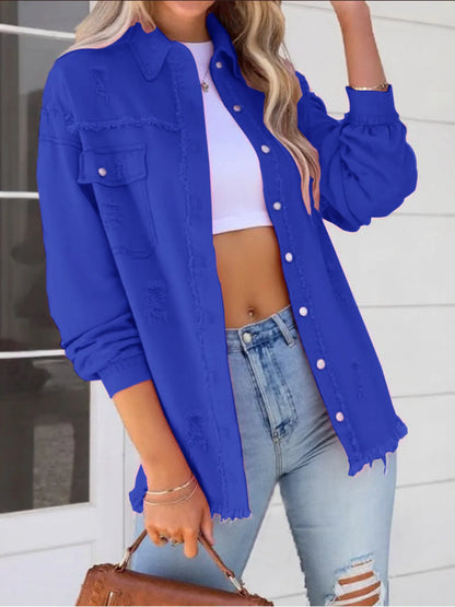 Oversized Distressed Denim Jacket with Frayed Edges and Buttoned Pockets in striking blue, a versatile choice for fashionable casual wear.