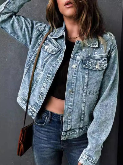 Plus Size Denim Jacket with Pearl Detail and Button Up Closure, Long Sleeve, Pocketed Style, showcasing a fashionable look with a relaxed fit, elegant pearl embellishments, and a modern cropped design.