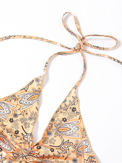 Trendy Printed Halter Neck Cami Top showing fabric pattern with a tied halter neck design, made of stretchy and opaque material, perfect for casual wear.