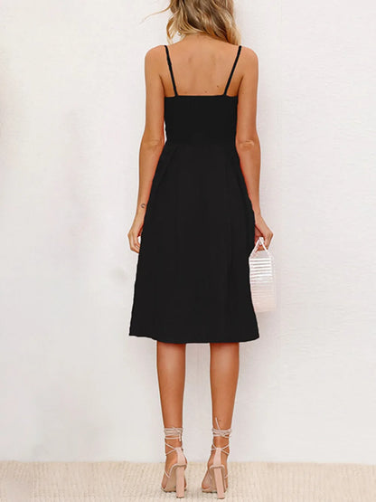 Back view of the Cutout Smocked Sweetheart Neck Cami Dress with Decorative Button and Opaque Design, showcasing its elegant silhouette.