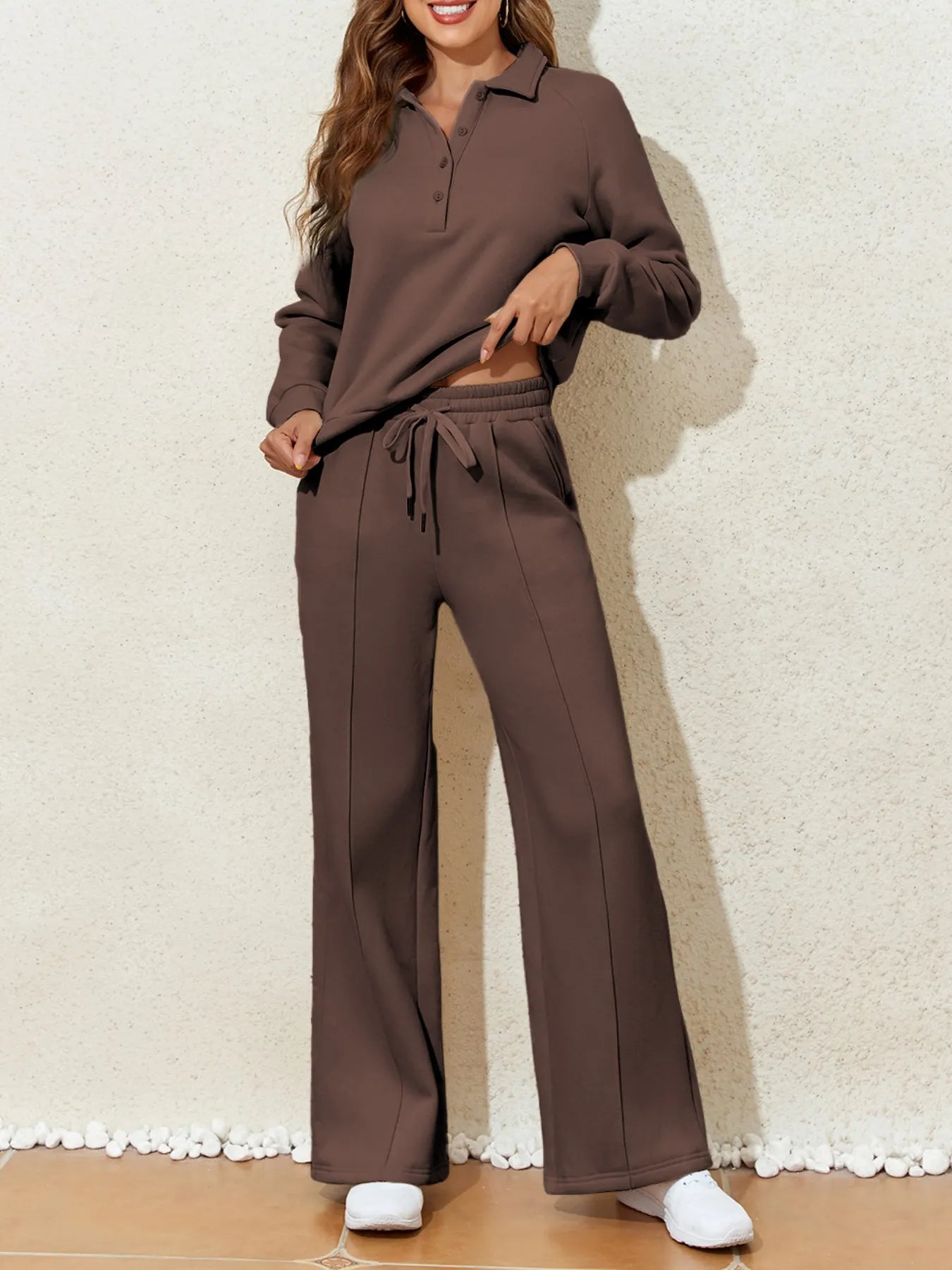 Model wearing the Trendsi Collared Sweatshirt & High Waist Pants Two-Piece Active Set in brown.