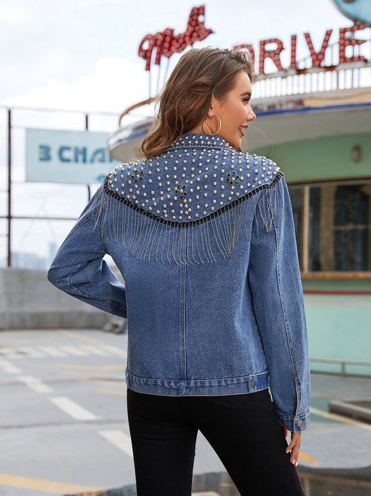 Back view of the Trendsi Studded Fringe Button Down Denim Jacket featuring stud details and fringe design, made from a stylish cotton blend with no stretch.