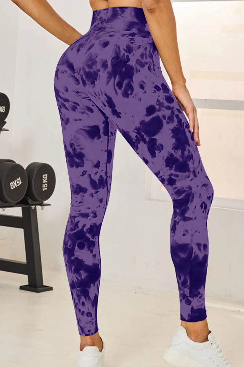 Slightly Stretchy Tie-Dye High Waist Active Leggings showcasing a stylish back view in bold purple tones.