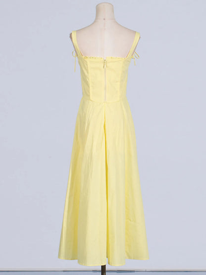 Back view of the Trendy Slit Sleeveless Midi Dress with Zip Back in yellow, highlighting the zip closure and elegant frill details.